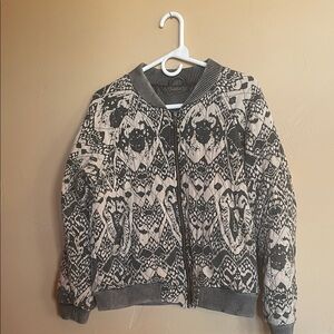 FREE PEOPLE Black and Cream Geometric Puffer Jacket. Has a washworn look.